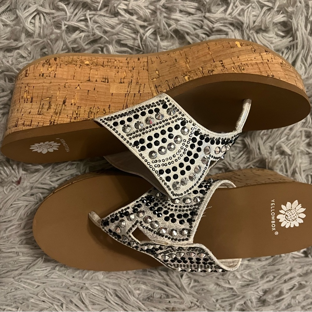 Yellow box size 7 wedges. White with black jewels. Never worn